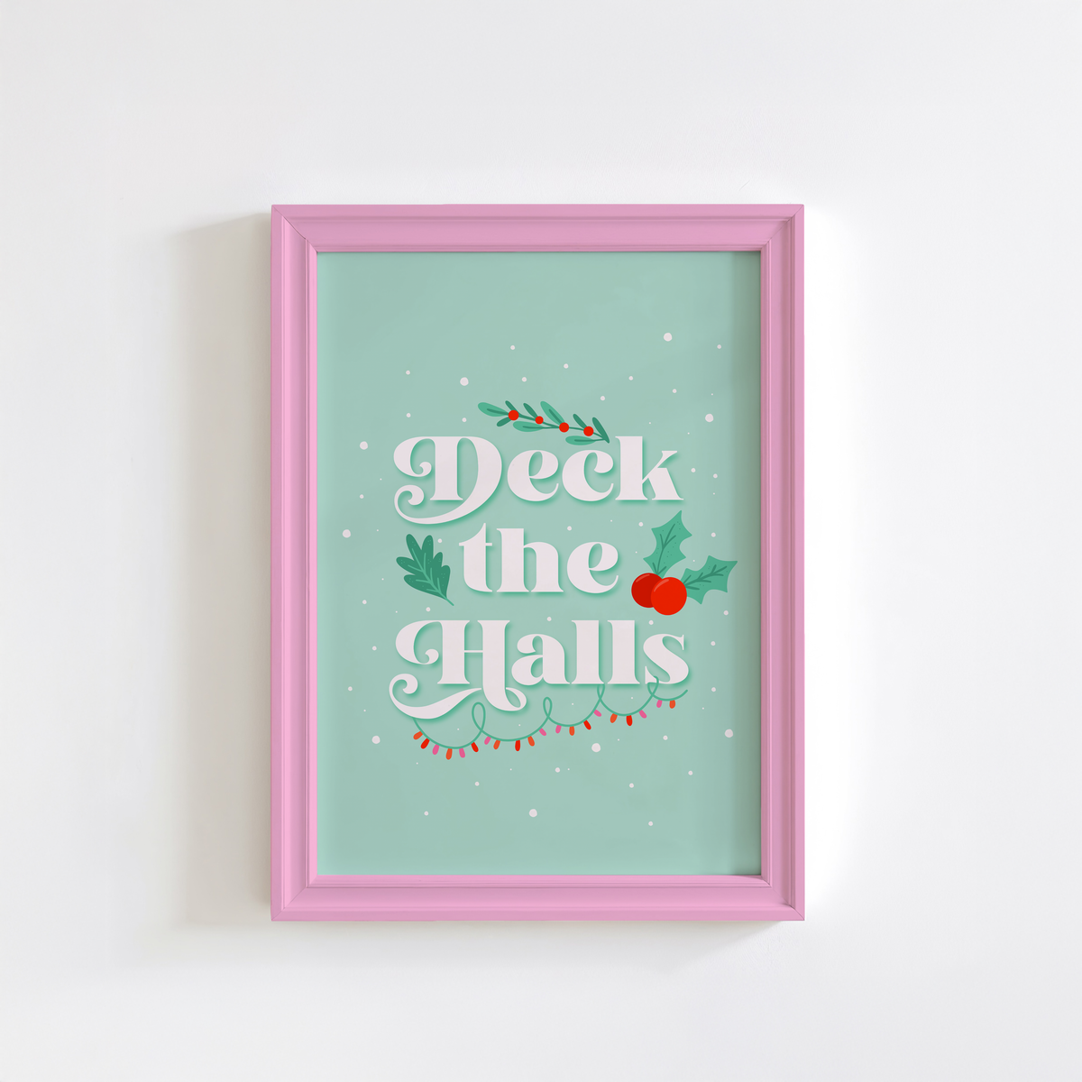 A pale green Christmas quote print, featuring the words 'deck the halls', surrounded by little Christmas themed doodles.