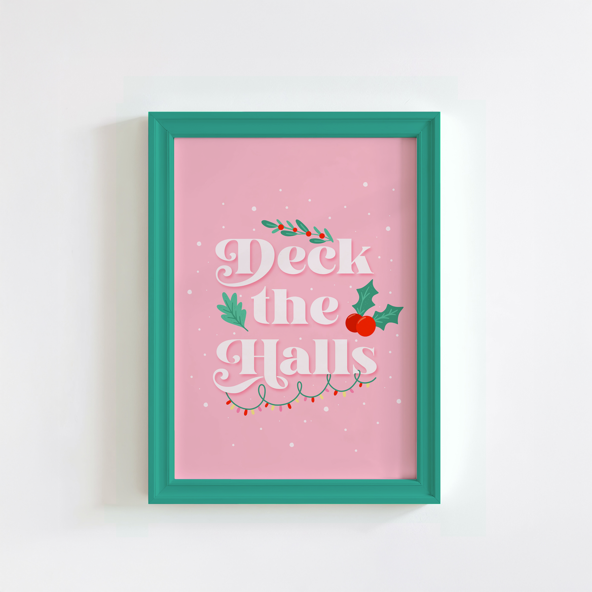 A pale pink Christmas quote print, featuring the words 'deck the halls', surrounded by little Christmas themed doodles.