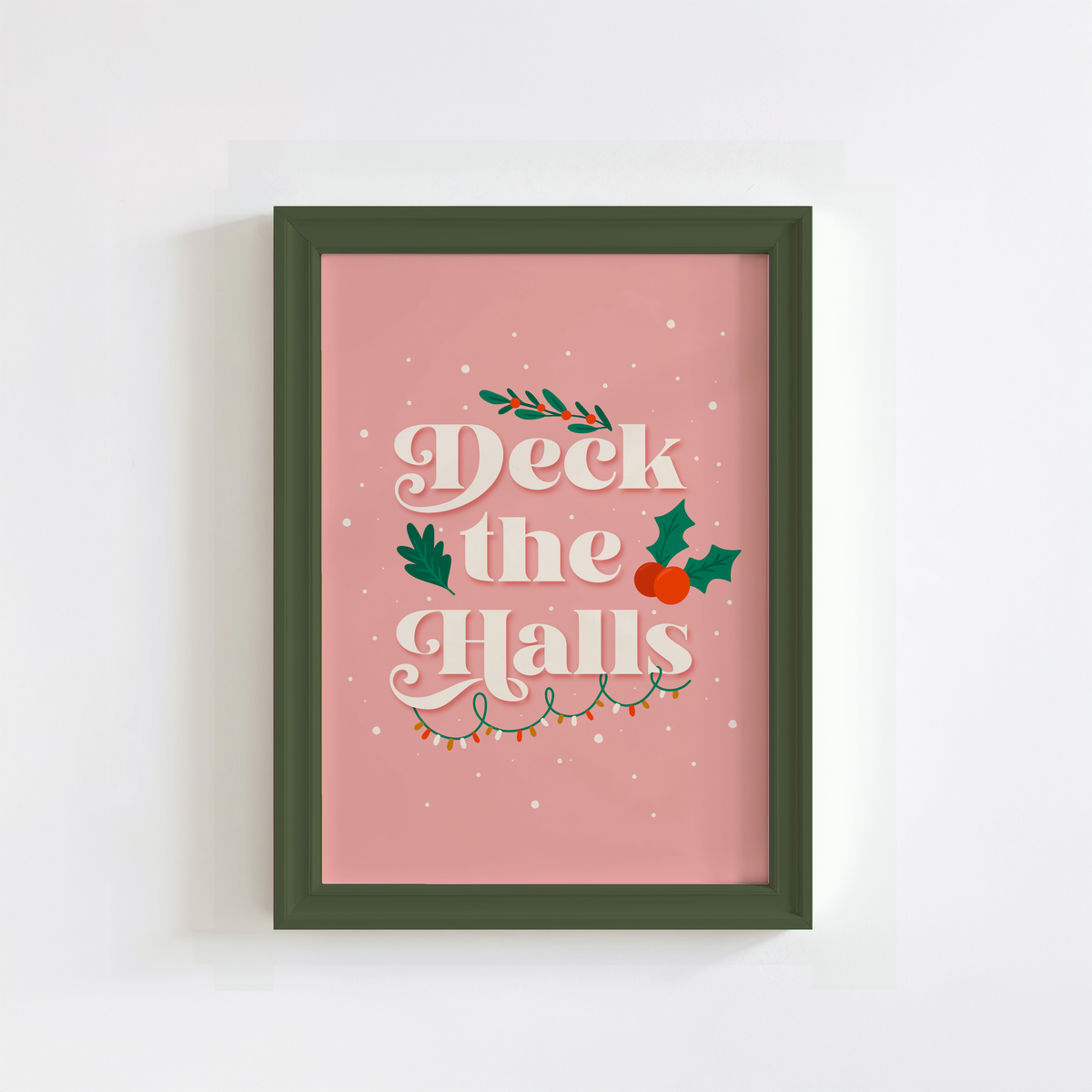 A warm pink Christmas quote print, featuring the words 'deck the halls', surrounded by little Christmas themed doodles.