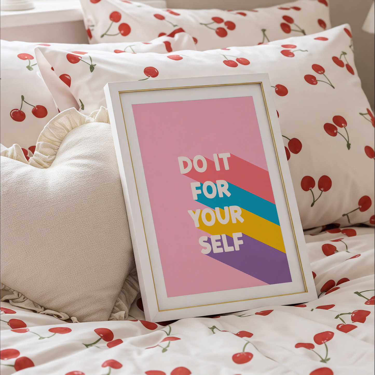 Framed poster with the words 'Do It For Yourself' on a pink background, with bright coloured stripes behind the text.