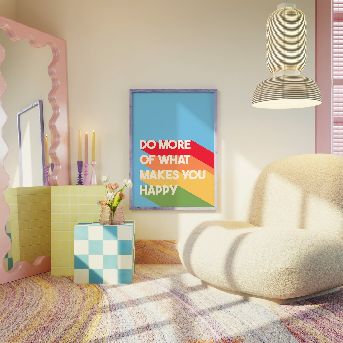 A colourful print, featuring a blue background and white text saying 'do more of what makes you happy' with bold stripes of red, orange, yellow and green behind the text.