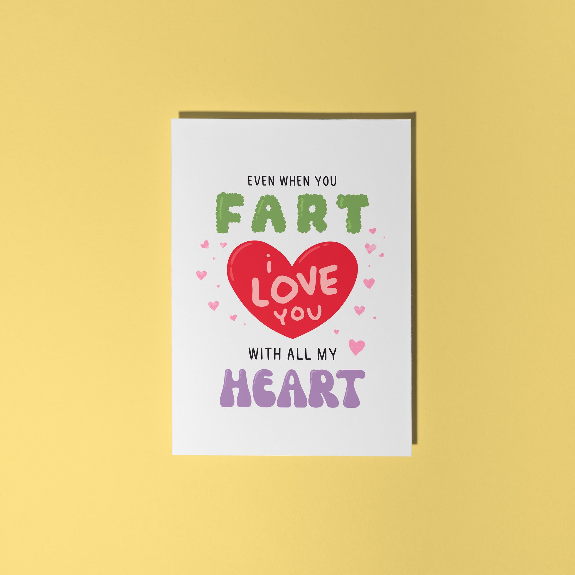 A funny quote love themed card, that says 'even when you fart, I love you with all my heart, in hand drawn lettering.