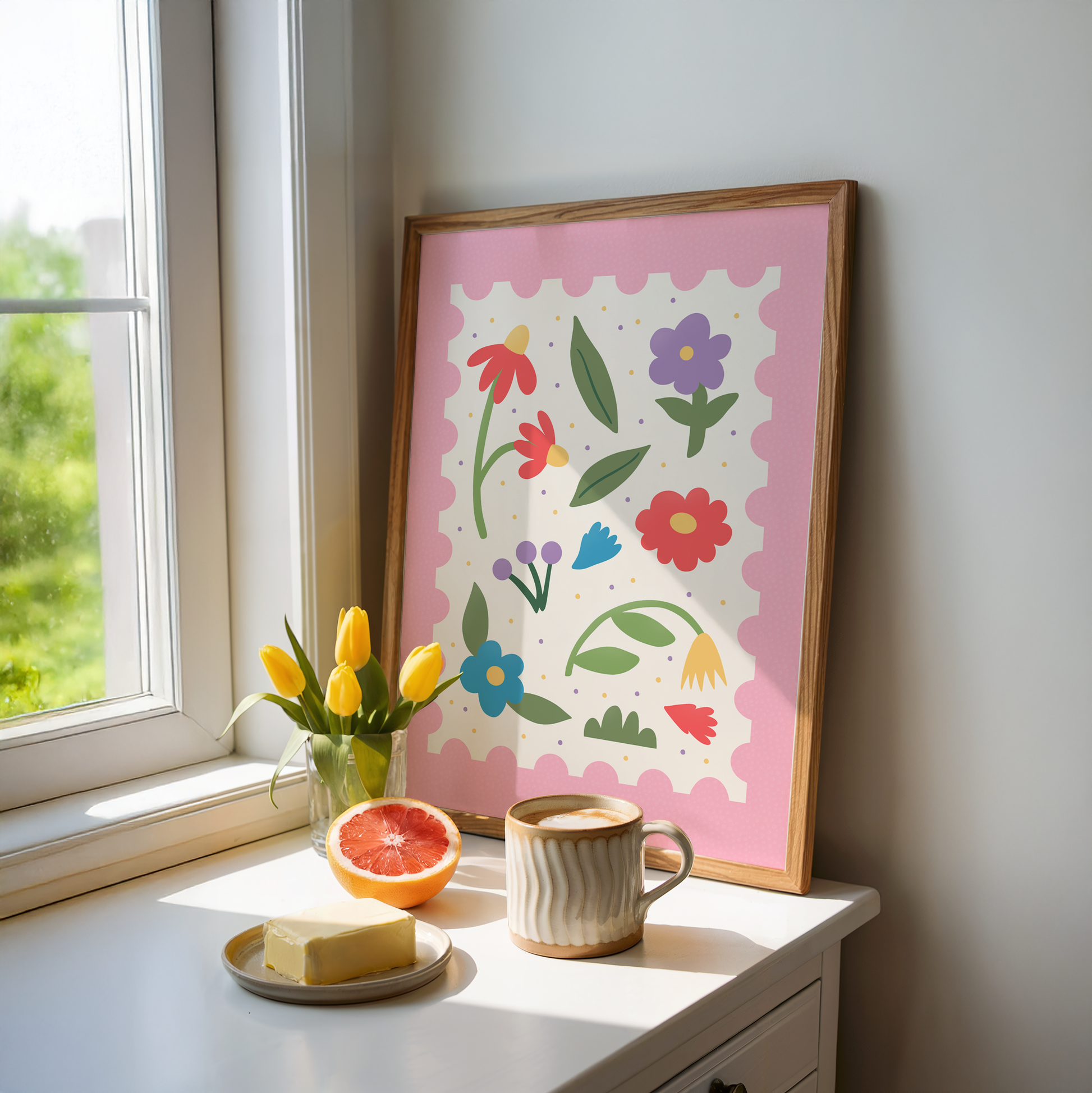 An illustrated print with brightly coloured floral elements in the centre, with a bold pink scalloped edged border.