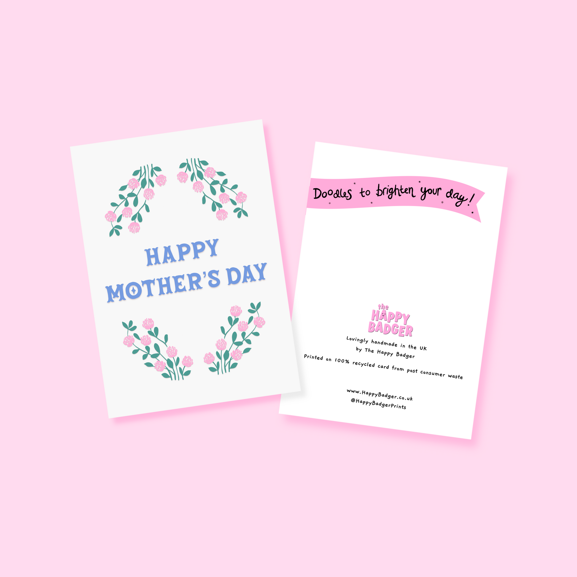 A Mother's Day card, with a pink and green floral border and the words 'Happy Mother's Day' written in the centre in blue.