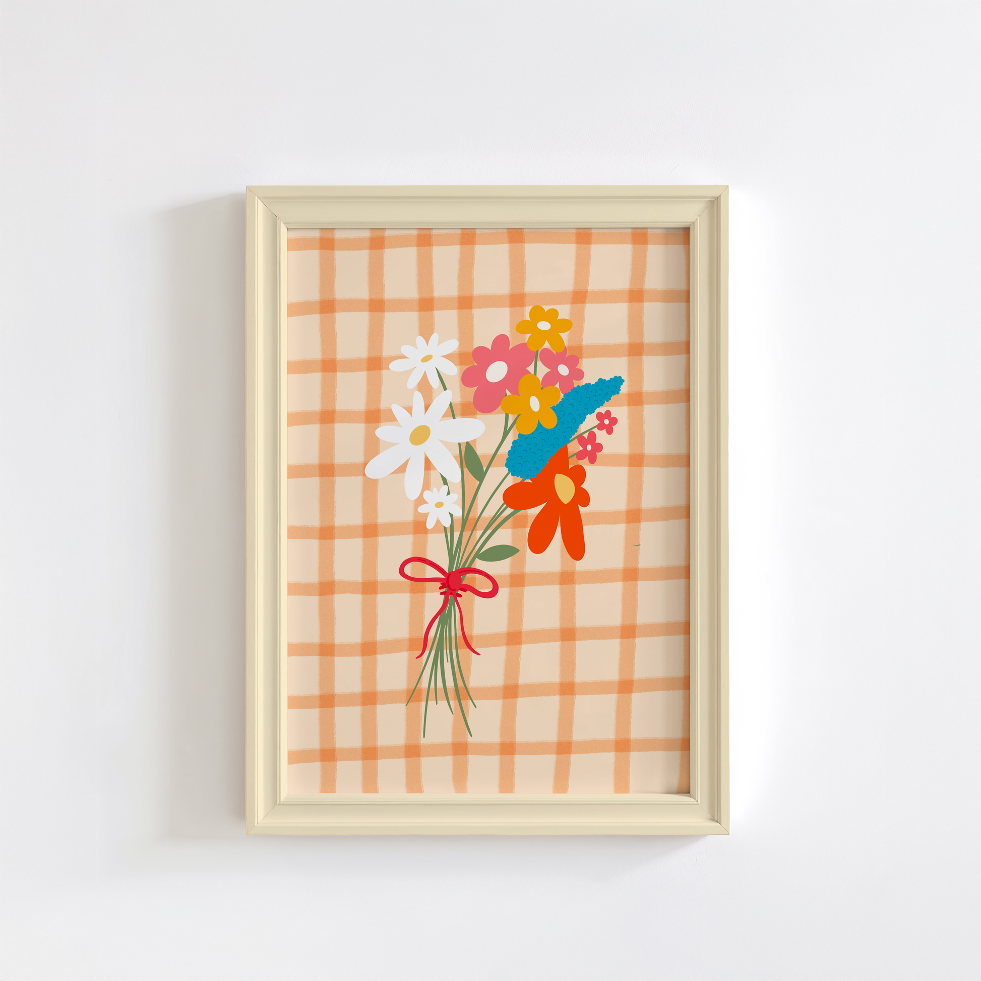 A framed art print featuring a hand-drawn bouquet of spring flowers in shades of white, pink, red, mustard, and teal on a cream and orange checkered background.