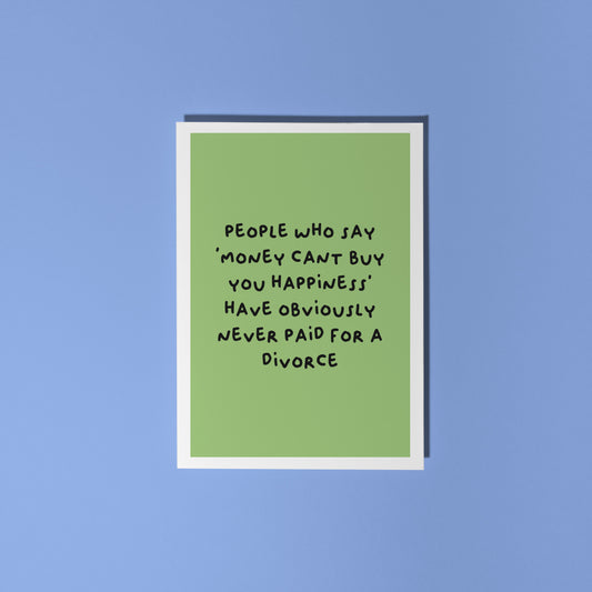 A green card with a funny quote about divorce on the front.