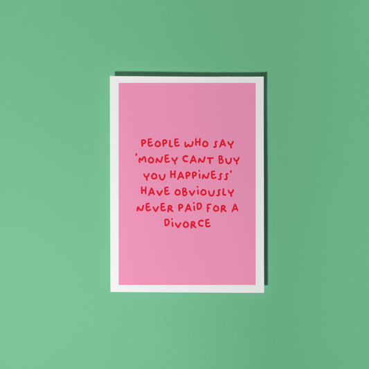 A pink card with a funny quote about divorce on the front.