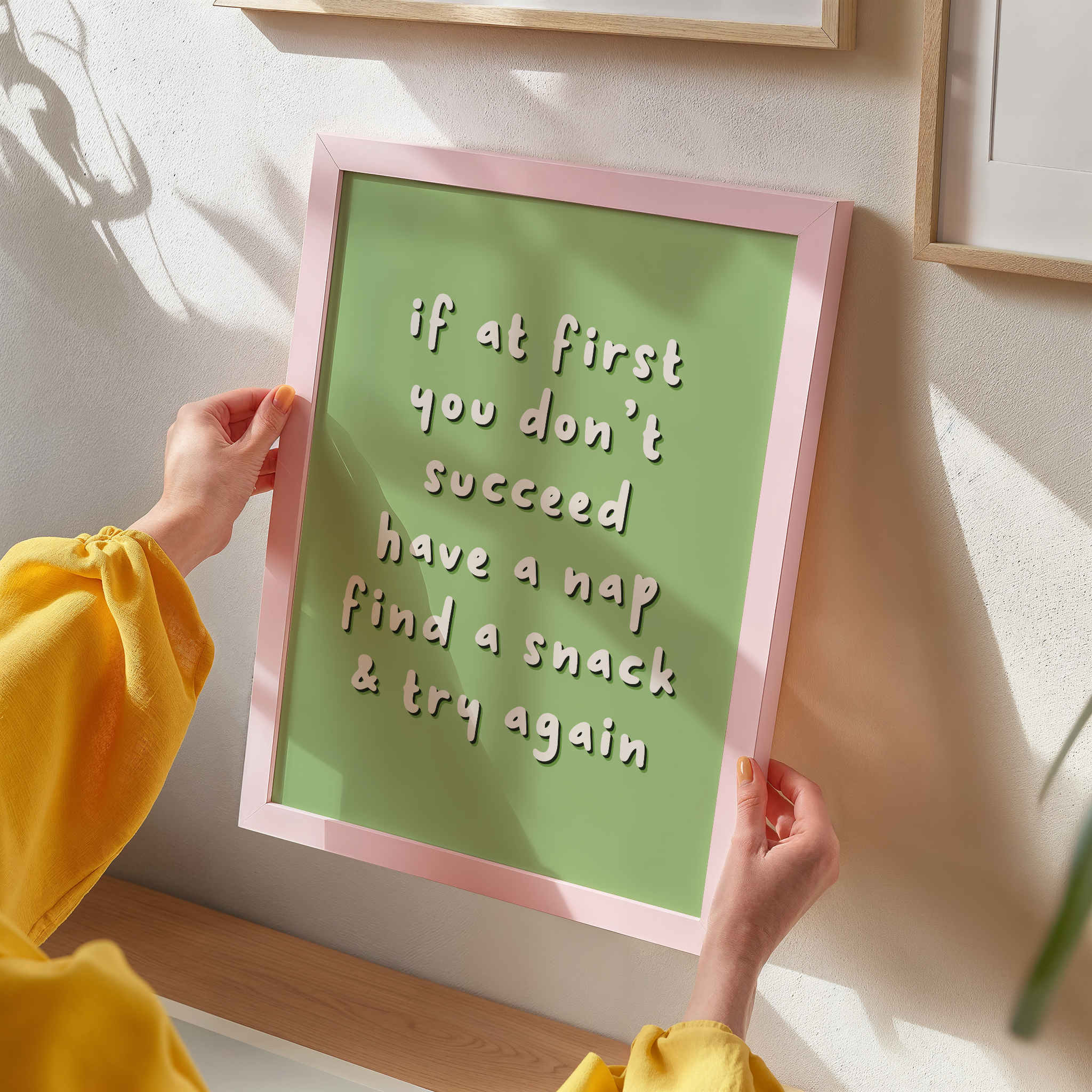 A funny quote that reads 'if it first you don't succeed have a nap find a snack and try again' on a green background.