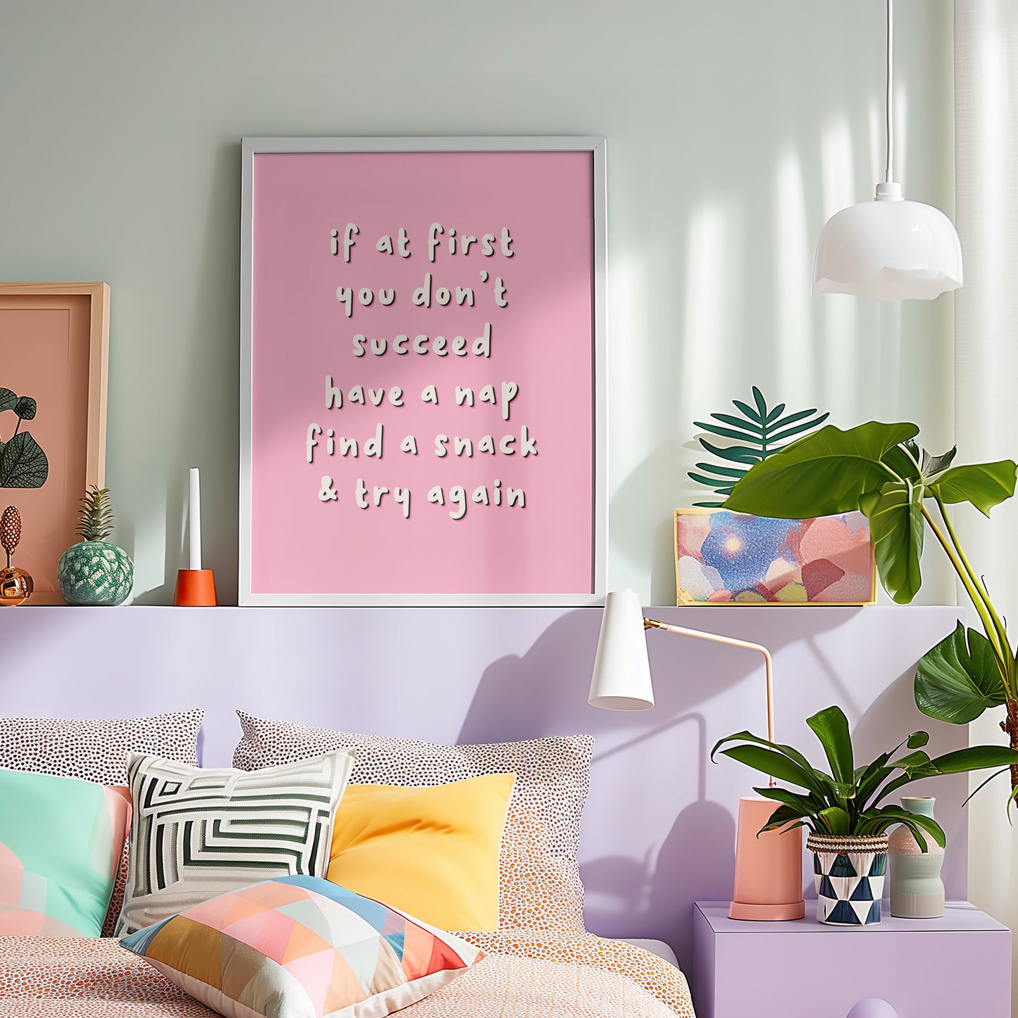 Framed pink poster with a funny lighthearted quote on a white background