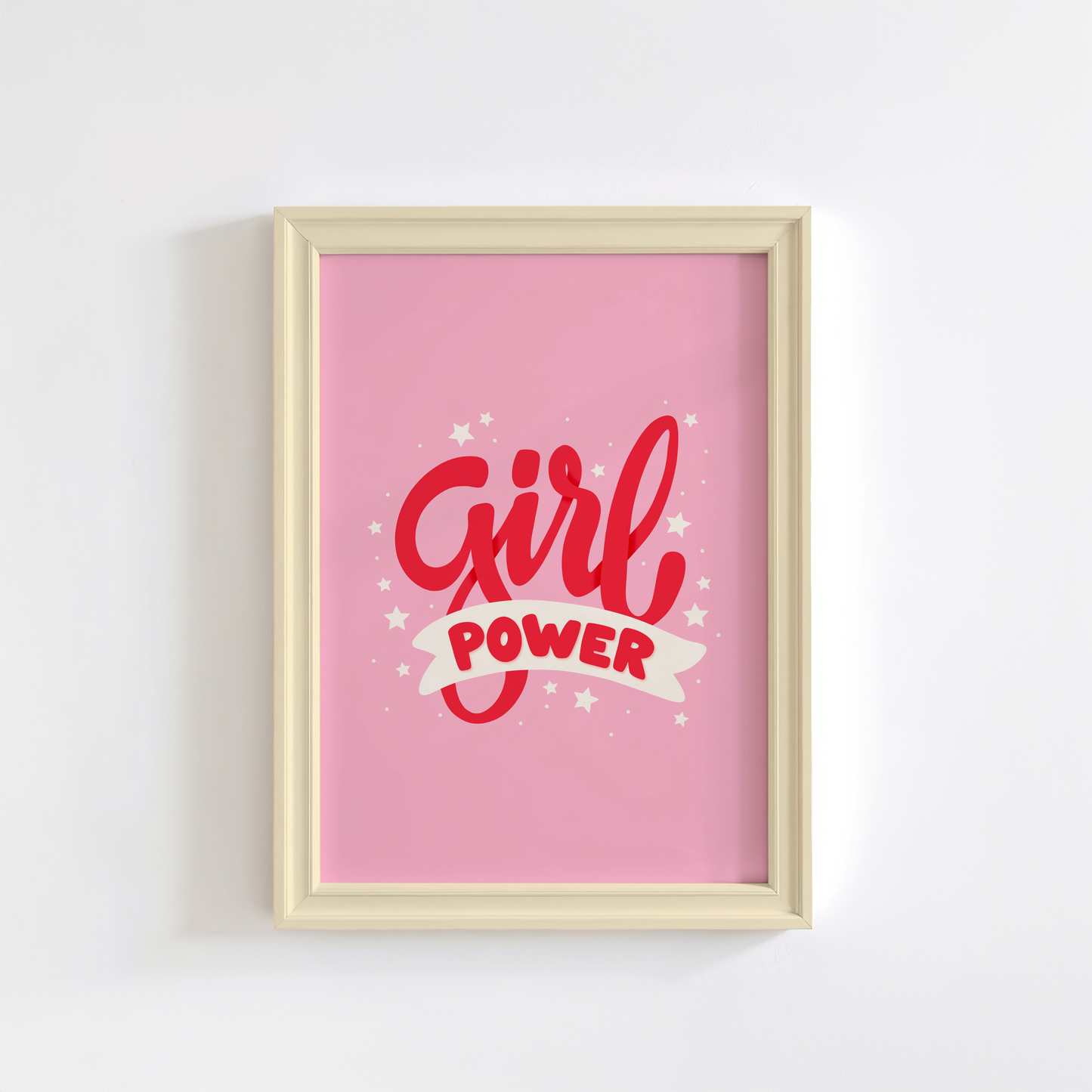 A pink print with red lettering that reads 'Girl power', decorated with little white stars.
