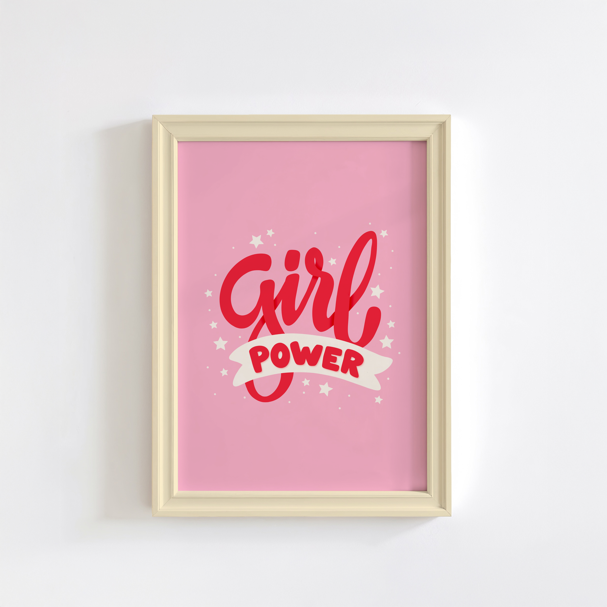 A pink print with red lettering that reads 'Girl power', decorated with little white stars.