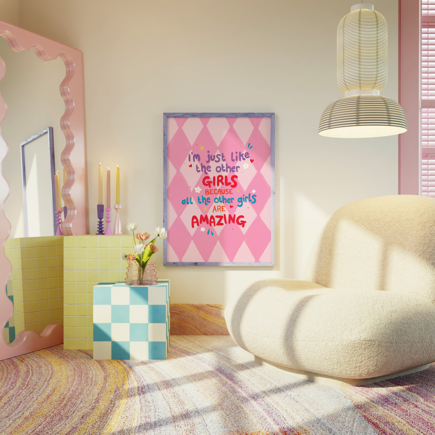 A pink harlequin patterned background with a female empowerment quote print in different coloured hand lettered text.