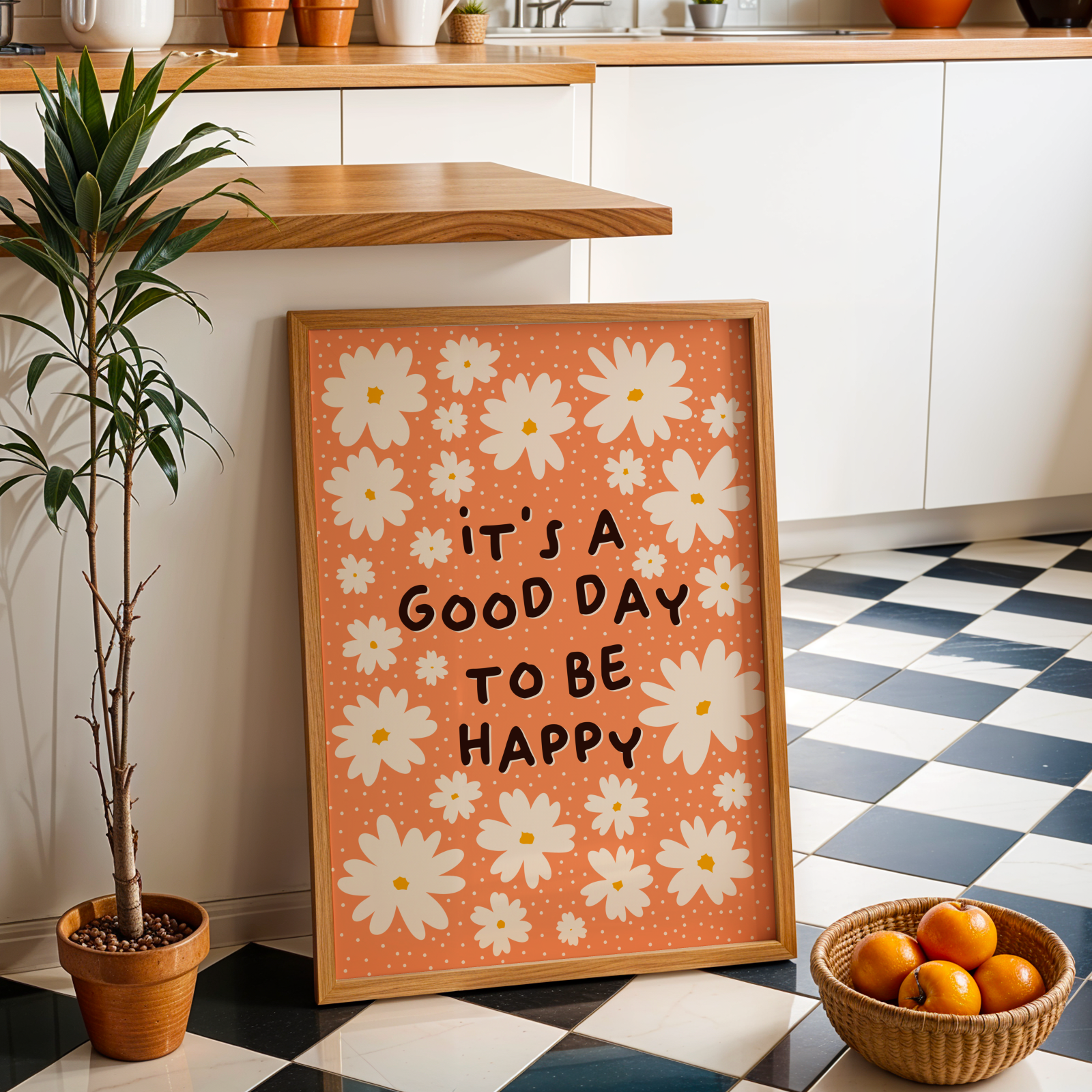 Orange wall art print with white daisies and 'it's a good day to be happy' quote.