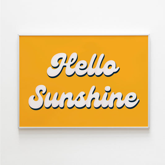 A bright yellow print with white script font saying Hello Sunshine.