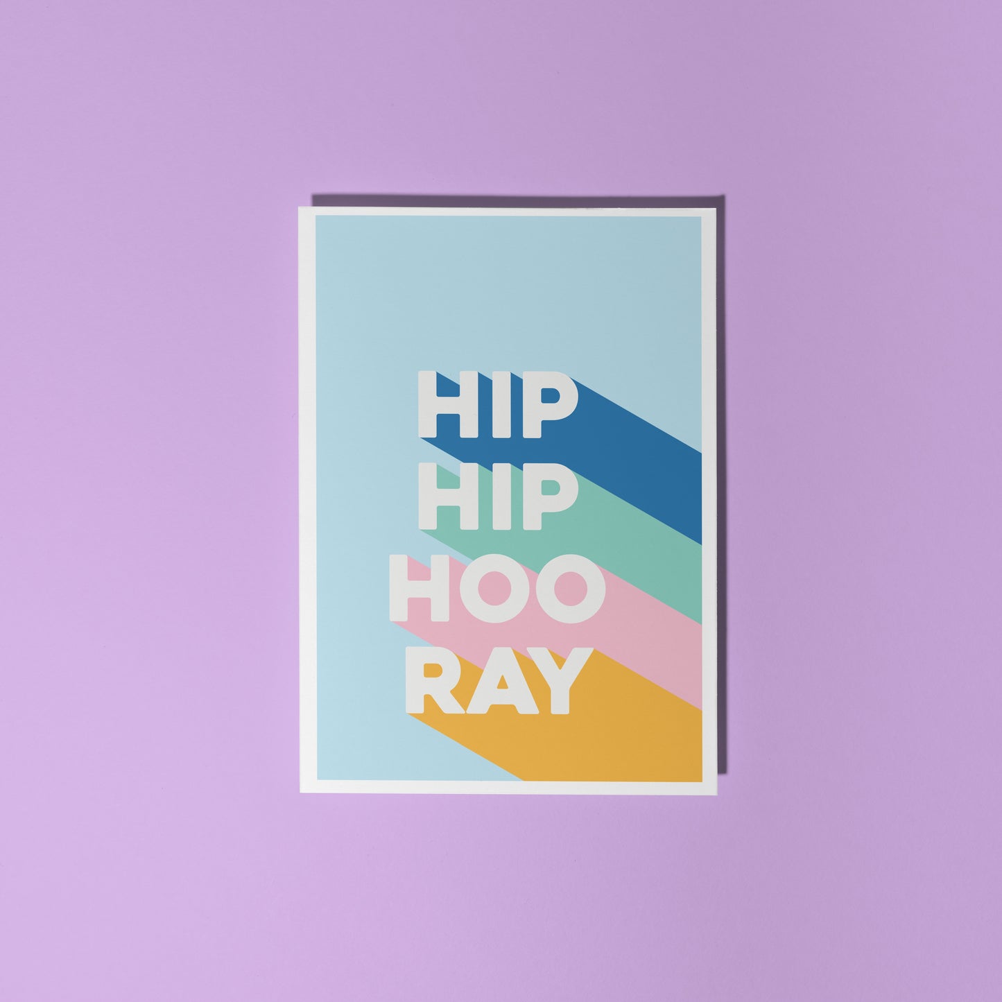 Colourful card with 'HIP HIP HOORAY' text on a purple background