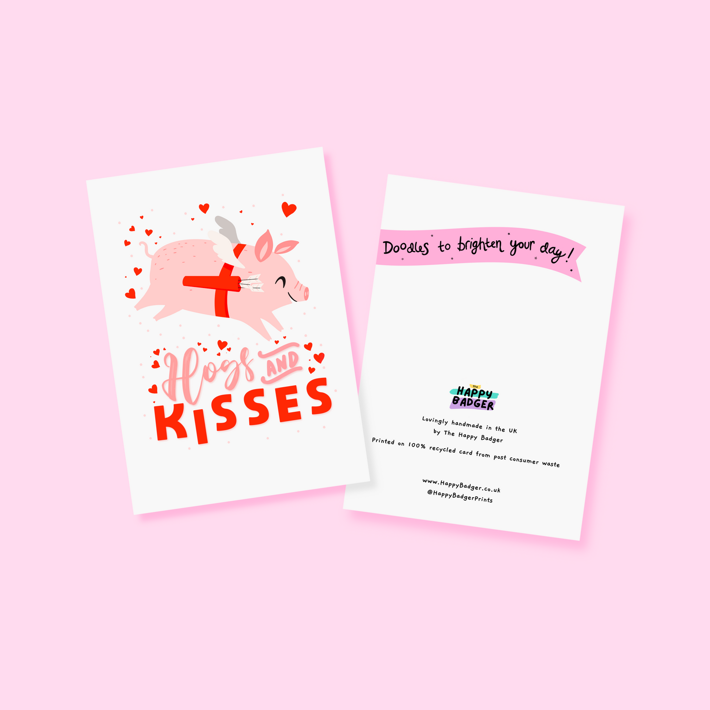 A love themed card, with a flying pig dressed as cupid and the words 'Hogs and kisses' underneath.