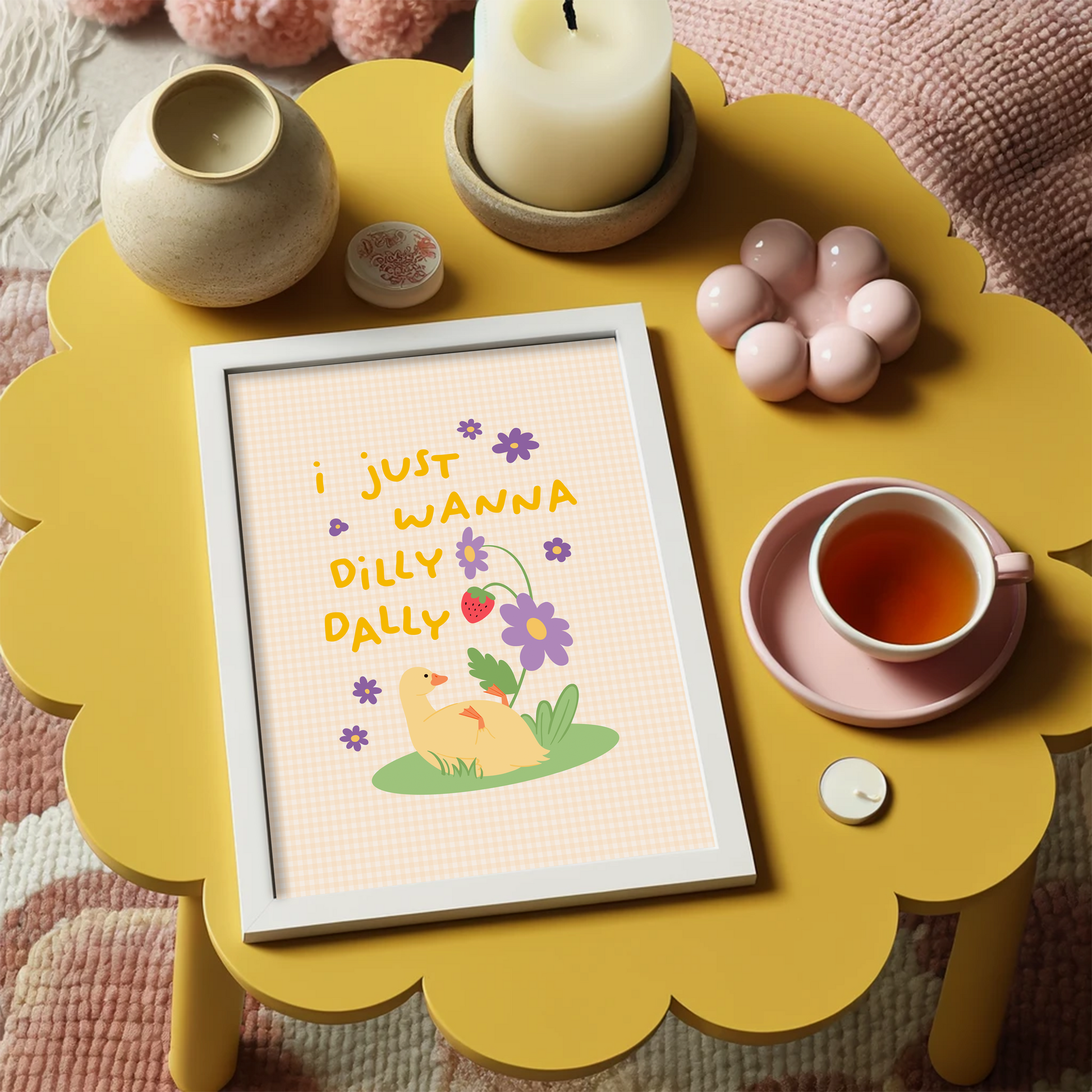 An illustrated print featuring an illustration of a duck sitting beneath a flower stem with the text 'I just wanna dilly dally' surrounded by purple florals and a yellow gingham background.