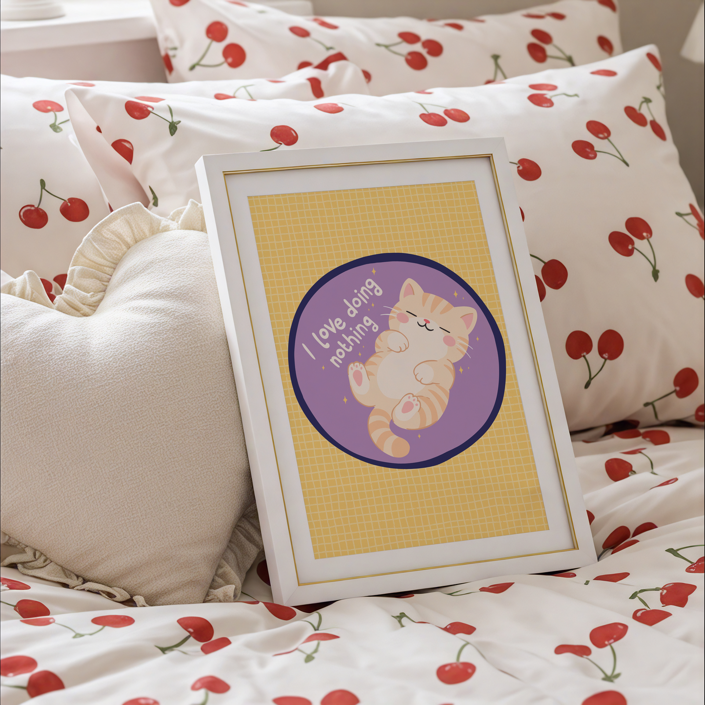 A yellow and purple print, with an illustration of a ginger cat laying on its back. Next to the cat is a quote that reads 'I love doing nothing'.