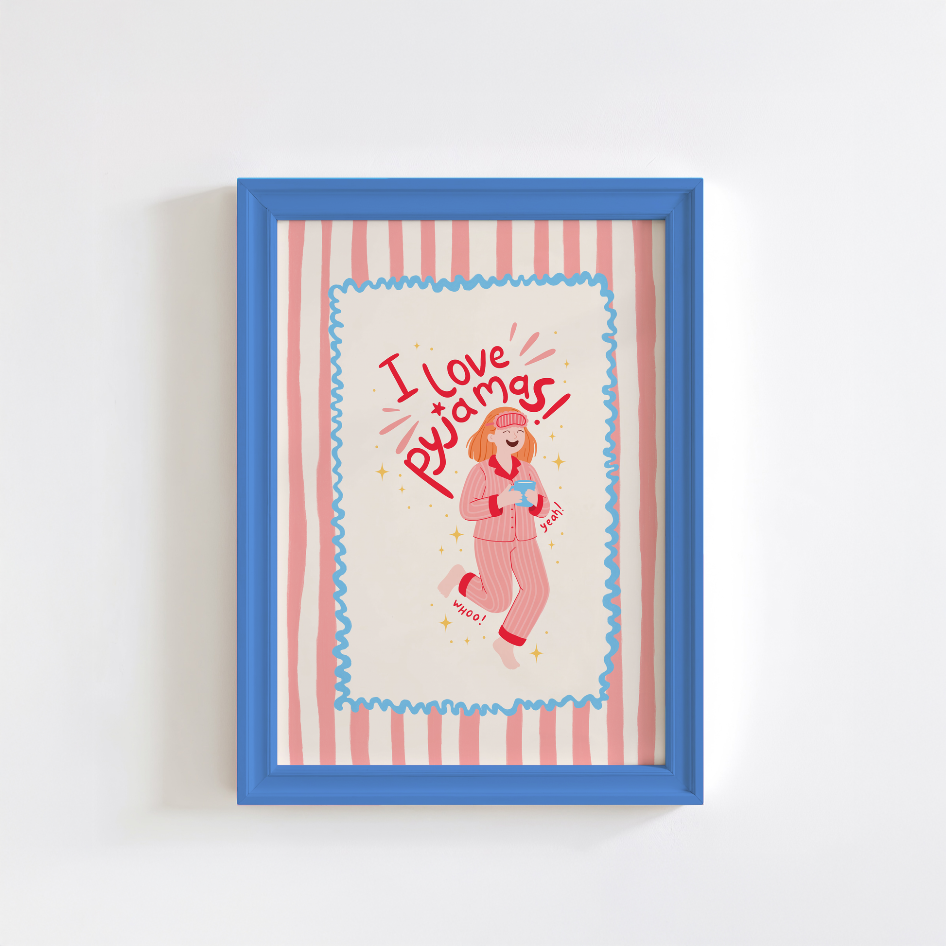 Framed artwork with a cartoon character and 'I love pajamas' text on a striped background.