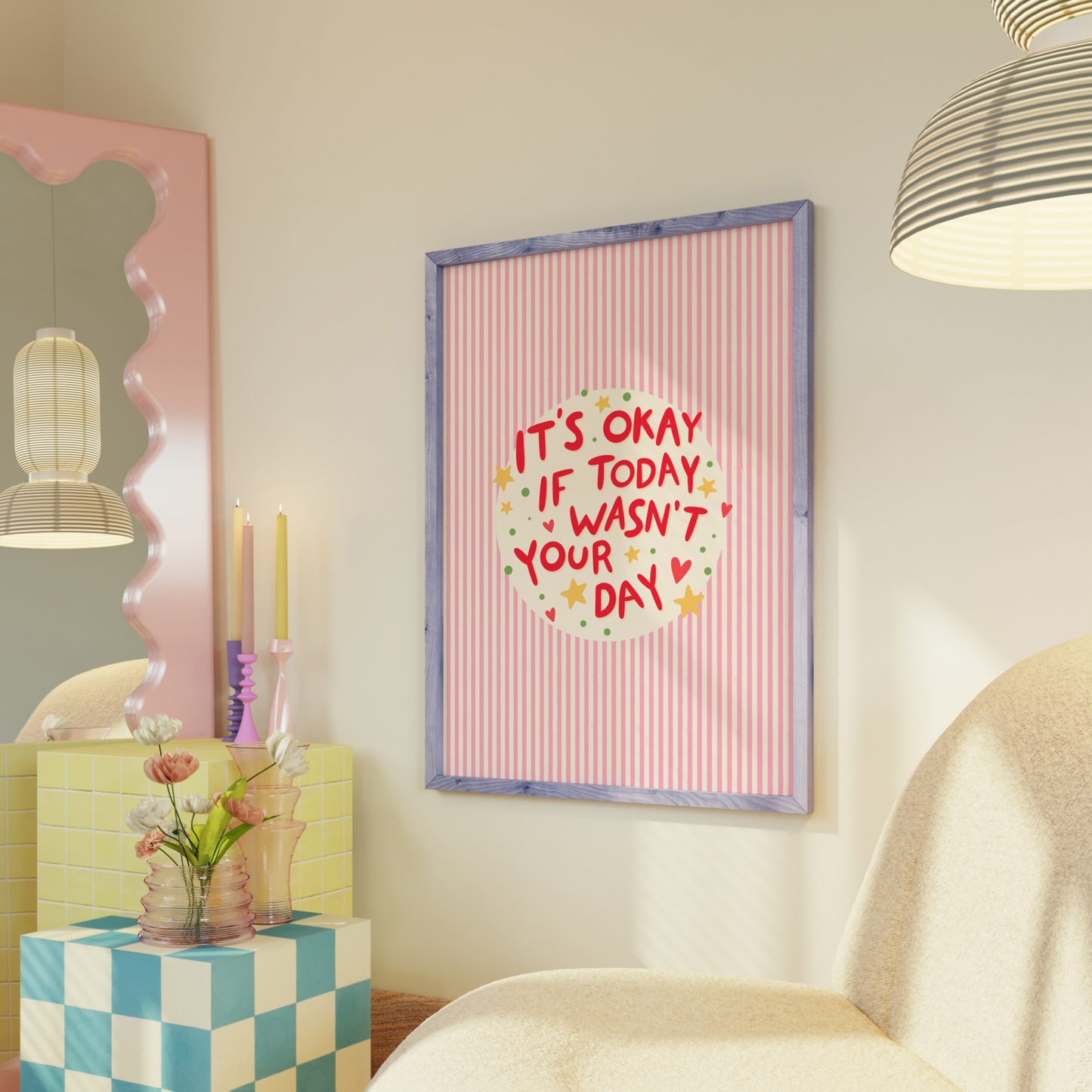 Framed poster with motivational quote in a room with decor elements.