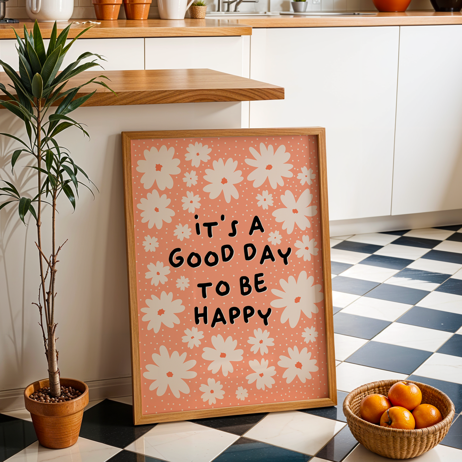 Several off-white daisies, and the words 'it's a good day to be happy' in black, all on a soft orange background print.