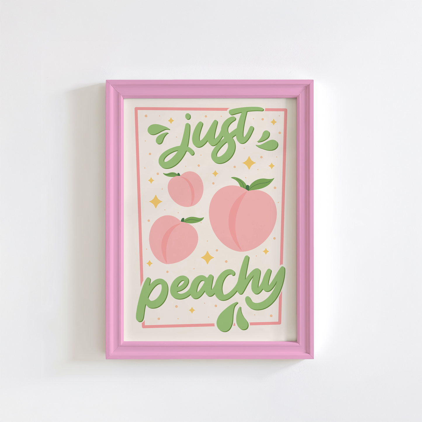 An art print with the text 'just peachy' hand-lettered in teal script, accompanied by illustrations of pink peaches and leaves, and a soft pink border.