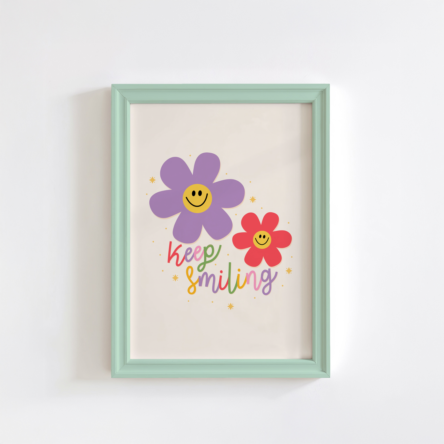 A positive quote print with two smiling daisies in purple and red.