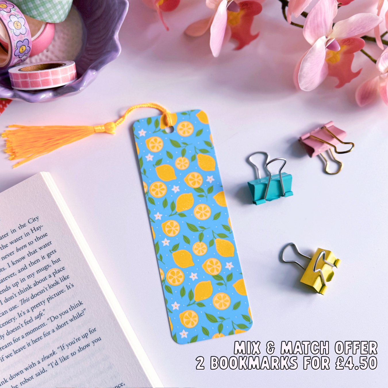 Bookmark with lemon pattern on a table with stationery items