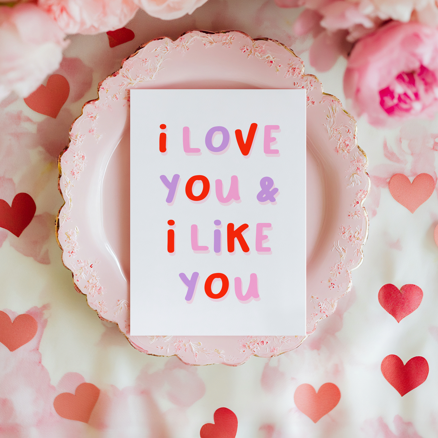 A card feating a quote from Leslie's wedding, in Parks and Recreation, saying 'I Love you and I like you'.