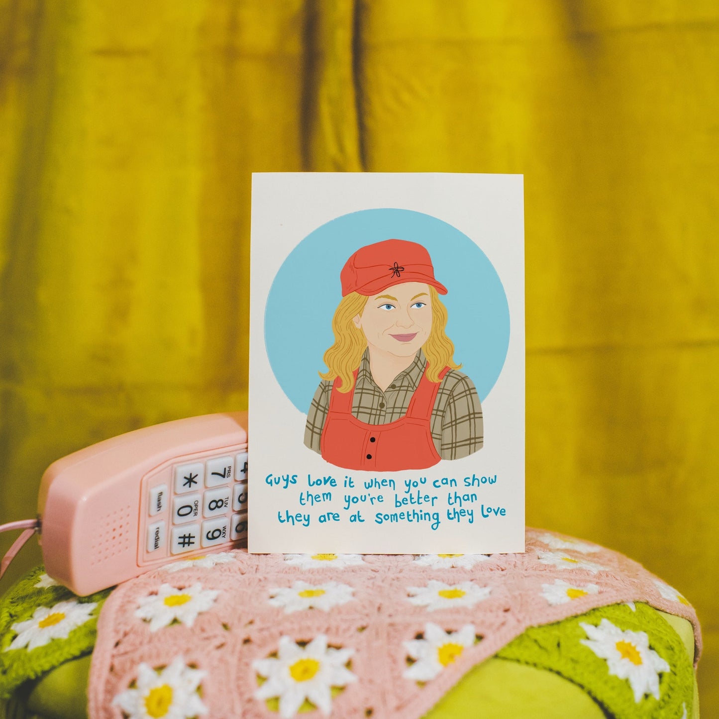 An illustrated print featuring  Leslie Knope and a quote from Parks and Recreation. 