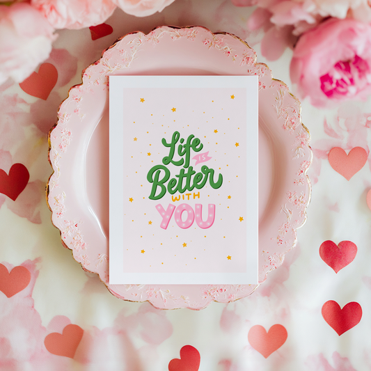 A card with green and pink text, saying life is better with you.