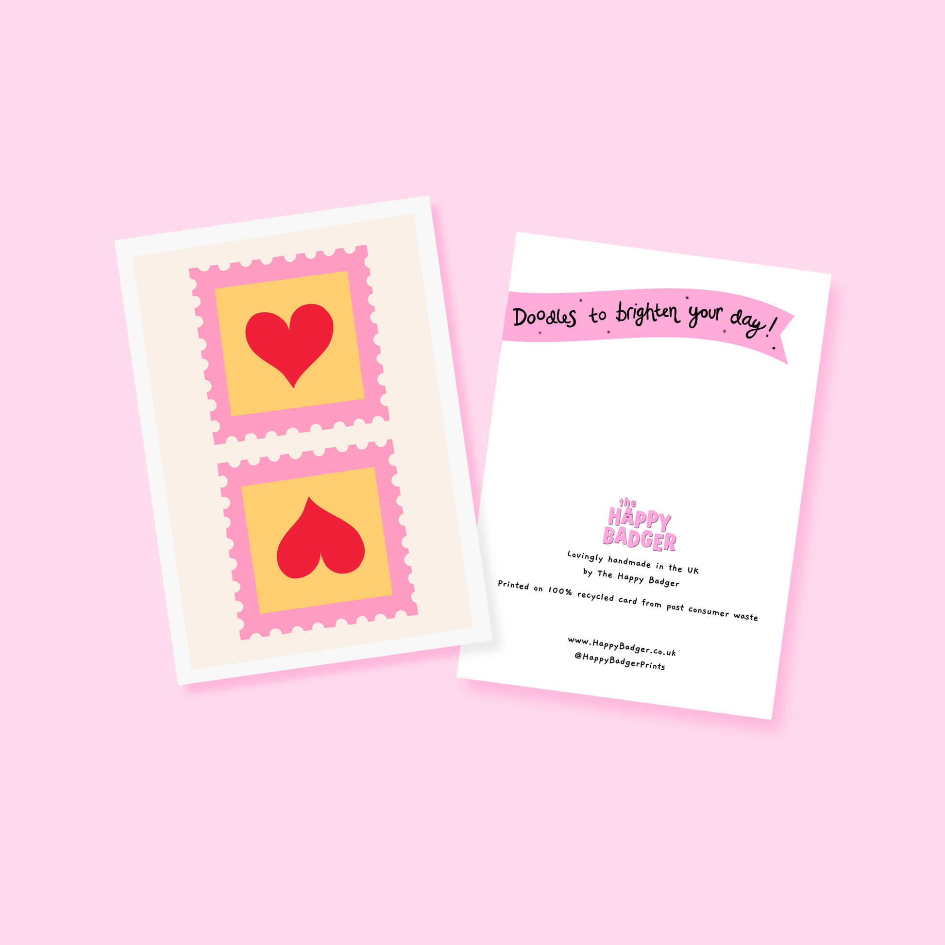 An illustrated card with two love heart postage stamps on the front, in pink, yellow and red.