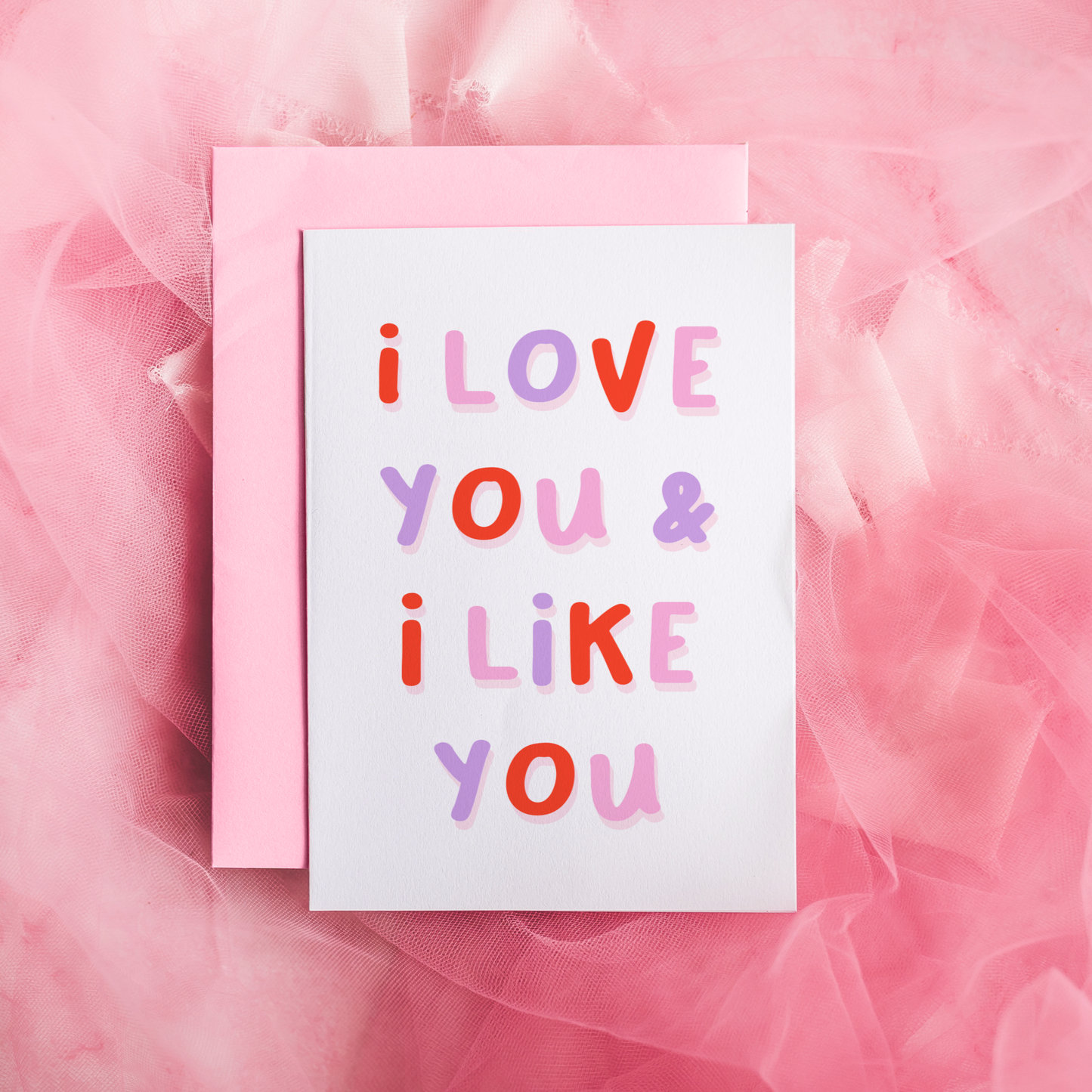 A card feating a quote from Leslie's wedding, in Parks and Recreation, saying 'I Love you and I like you'.