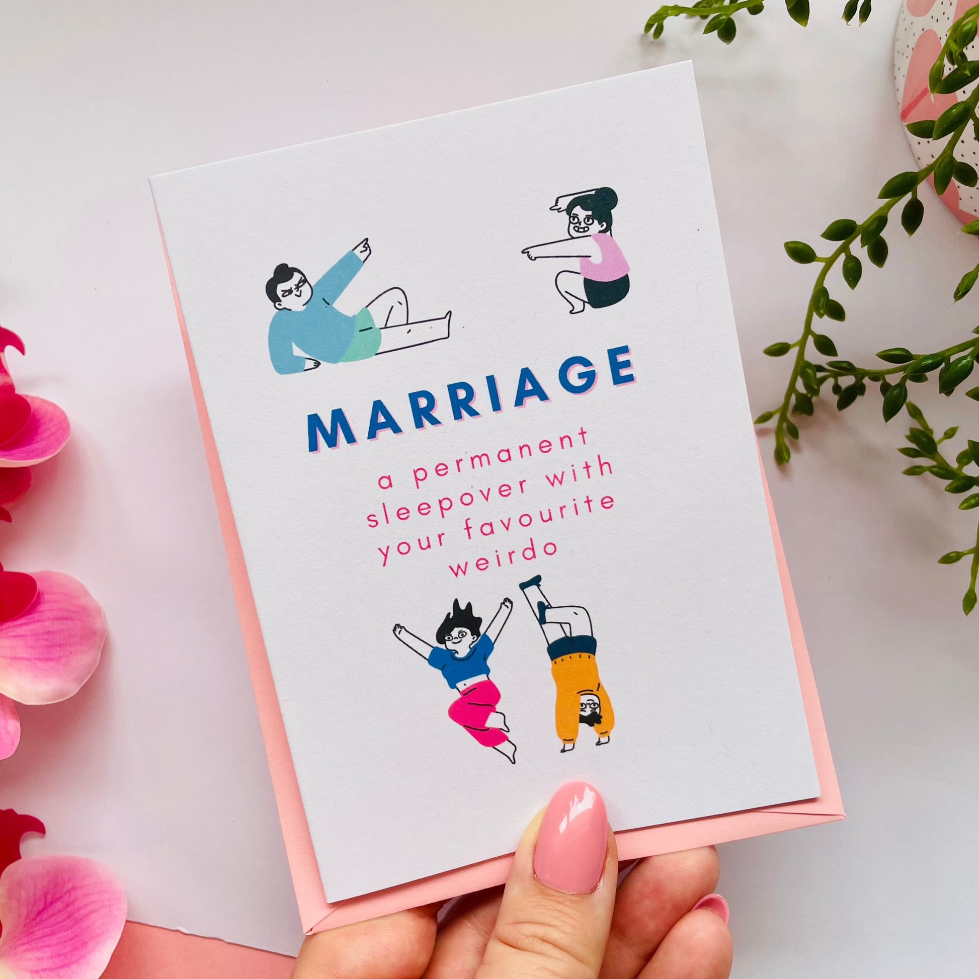 A cute card, for weddings or engagements, with the words 'marriage - a permanent sleepover with your favourite weirdo'.