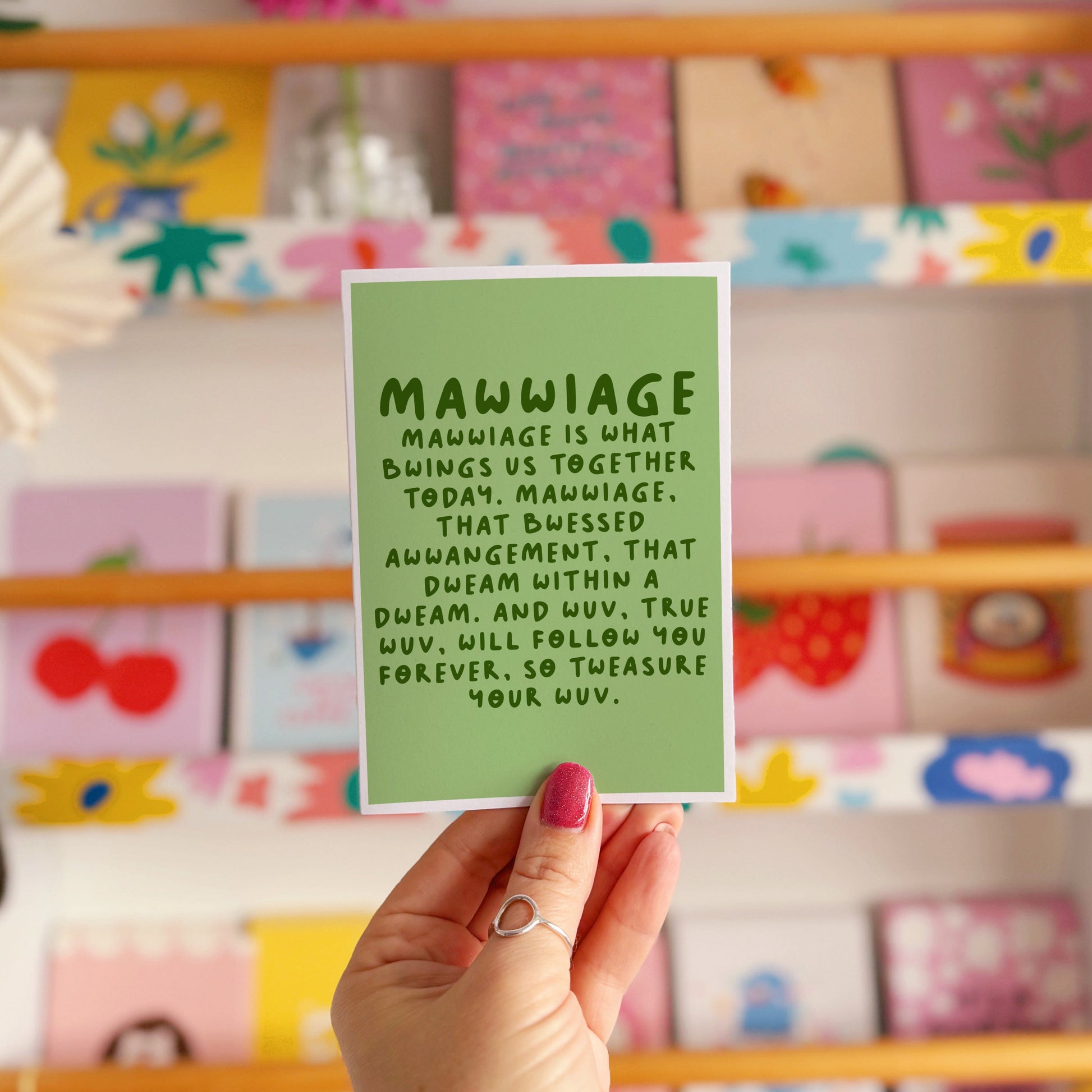 A green card with a quote from The Princess Bride about marriage.