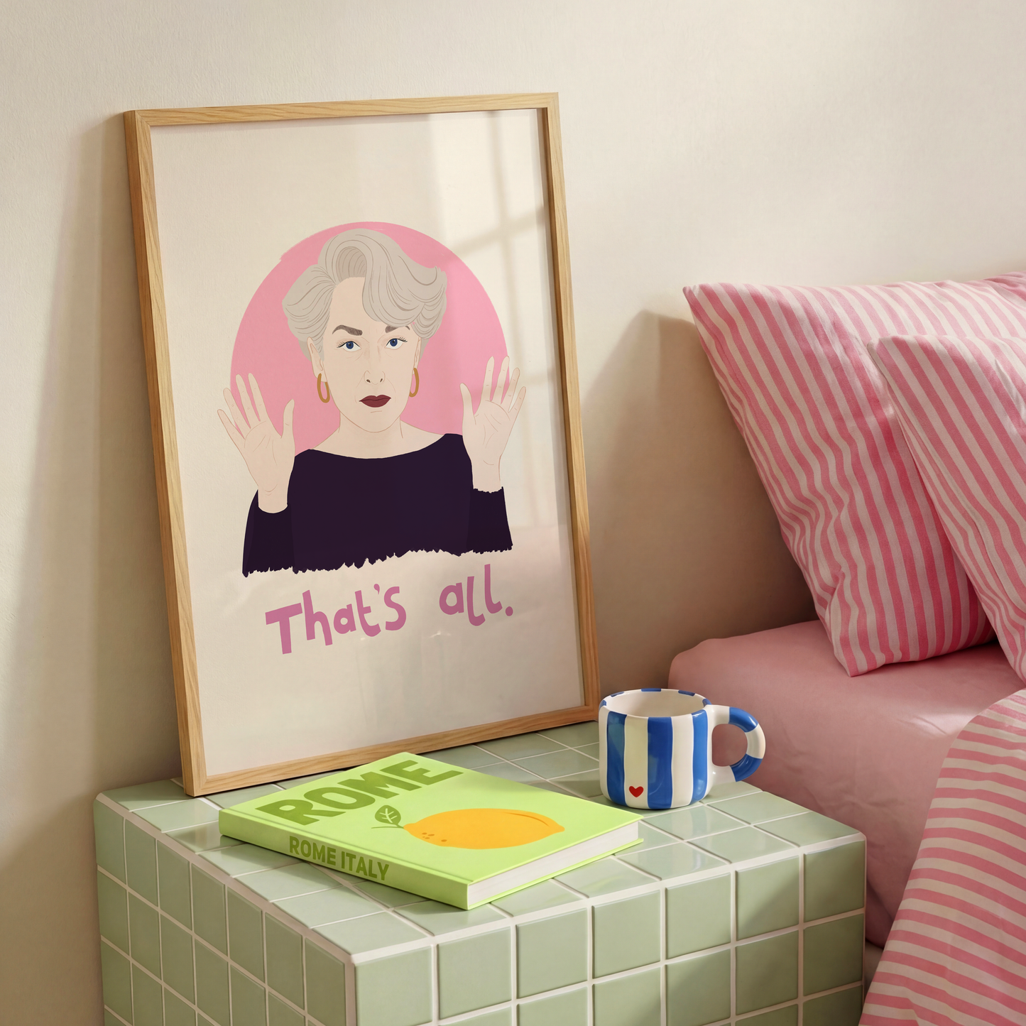 A portrait print of Miranda Priestly from The Devil Wears Prada, featuring her quote 'that's all.' underneath.