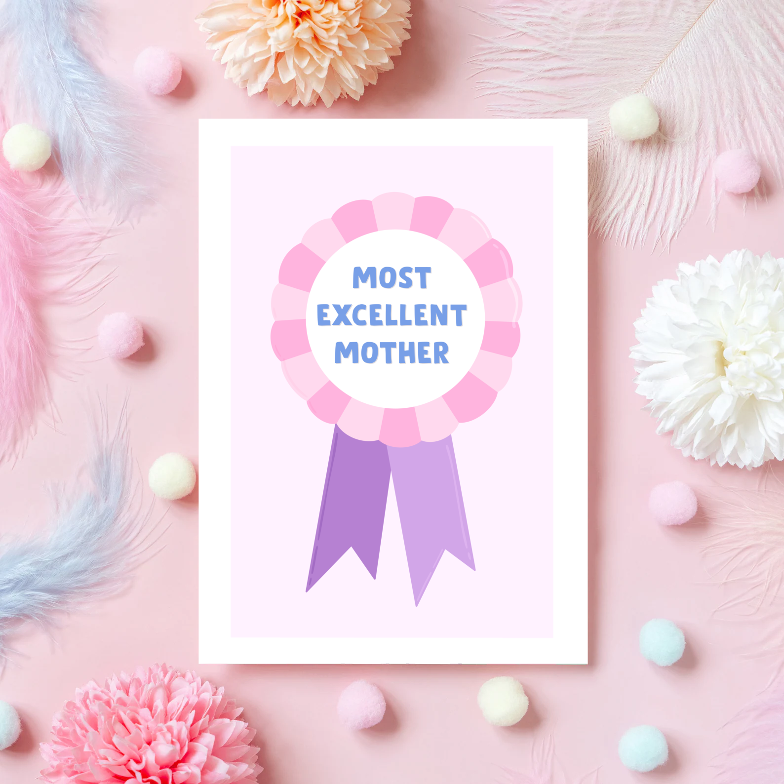 A Mother's Day card, with a pink and purple rosette and the words 'Most Excellent Mother' written on the rosette.