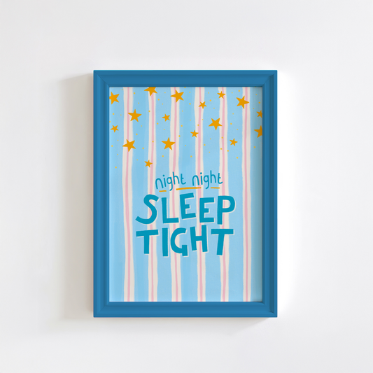 Framed artwork with 'night night sleep tight' text and star patterns on a light blue background.