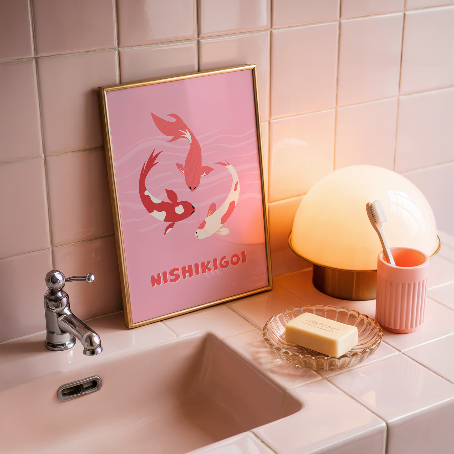 A pink print with an illustration of three Nishikigoi or Japanese carp fish. 
