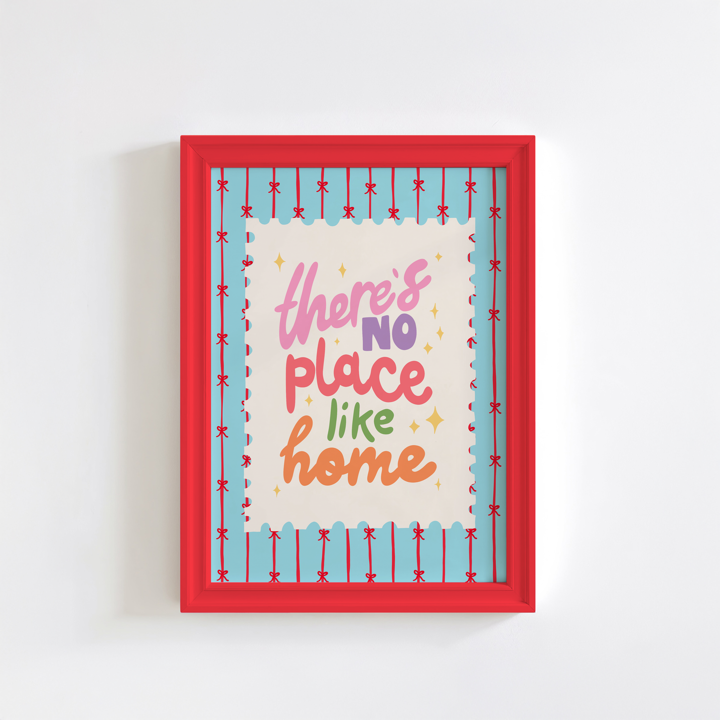 A blue print with red stripes and bows across it, in the centre is a postage-stamp style border with hand lettered text that reads 'there's no place like home'.
