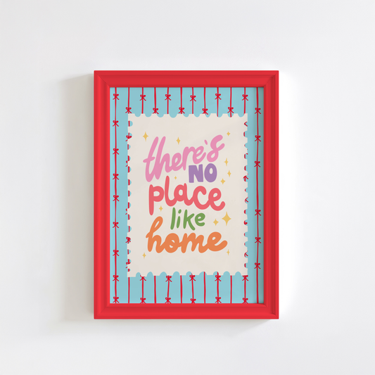 A blue print with red stripes and bows across it, in the centre is a postage-stamp style border with hand lettered text that reads 'there's no place like home'.