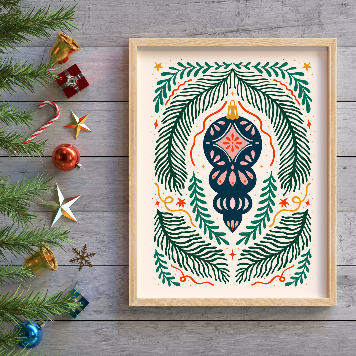 A detailed Christmas illustration print, featuring a traditional style Christmas bauble in the centre of the page with a symmetrical design or fir, ribbons and stars around it.