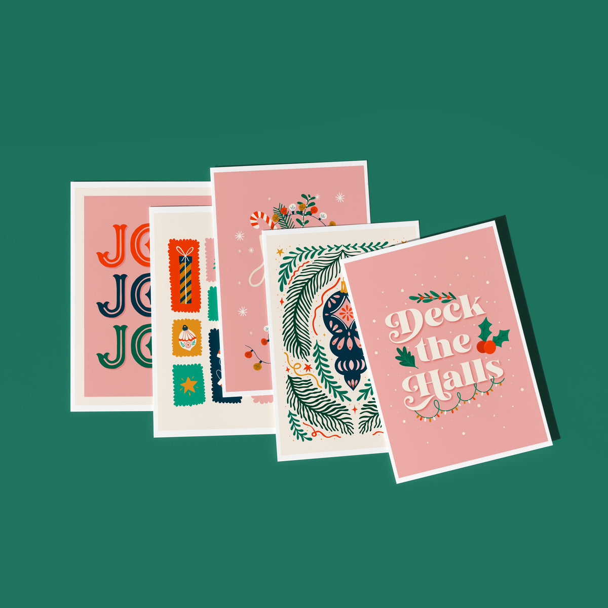 An image showing five Christmas cards in various designs.