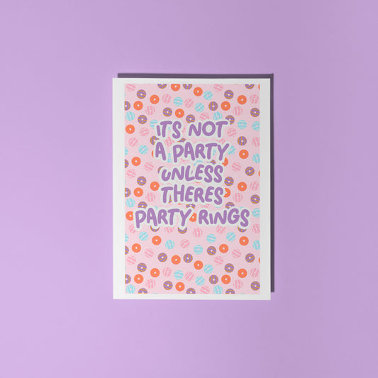A birthday card, with a party ring pattern, and the text says 'it's not a party unless there's party rings'