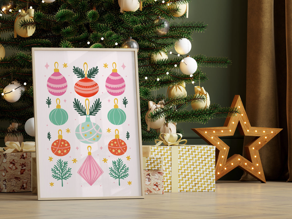 An illustrated Christmas print with 9 brightly coloured baubles, with sprigs of pine decorating the page.