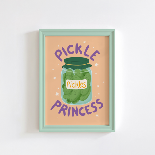 Artwork with an illustration of a jar of pickles and 'Pickle Princess' quote on a soft orange background.
