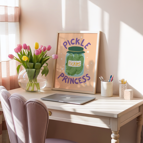 Artwork with an illustration of a jar of pickles and 'Pickle Princess' quote on a soft orange background.