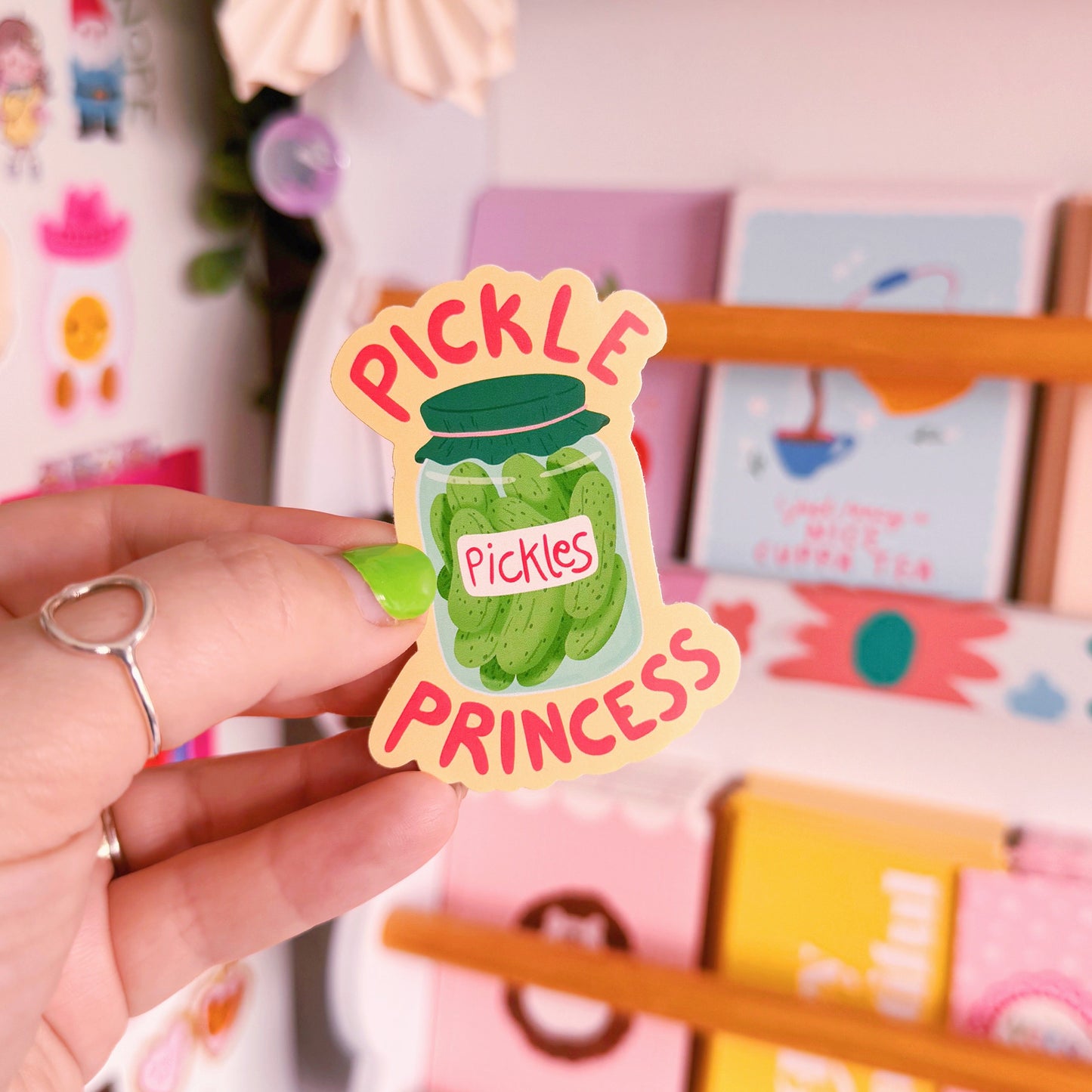 A waterproof vinyl sticker featuring a jar of pickles and the words 'pickle princess' around the jar illustration.