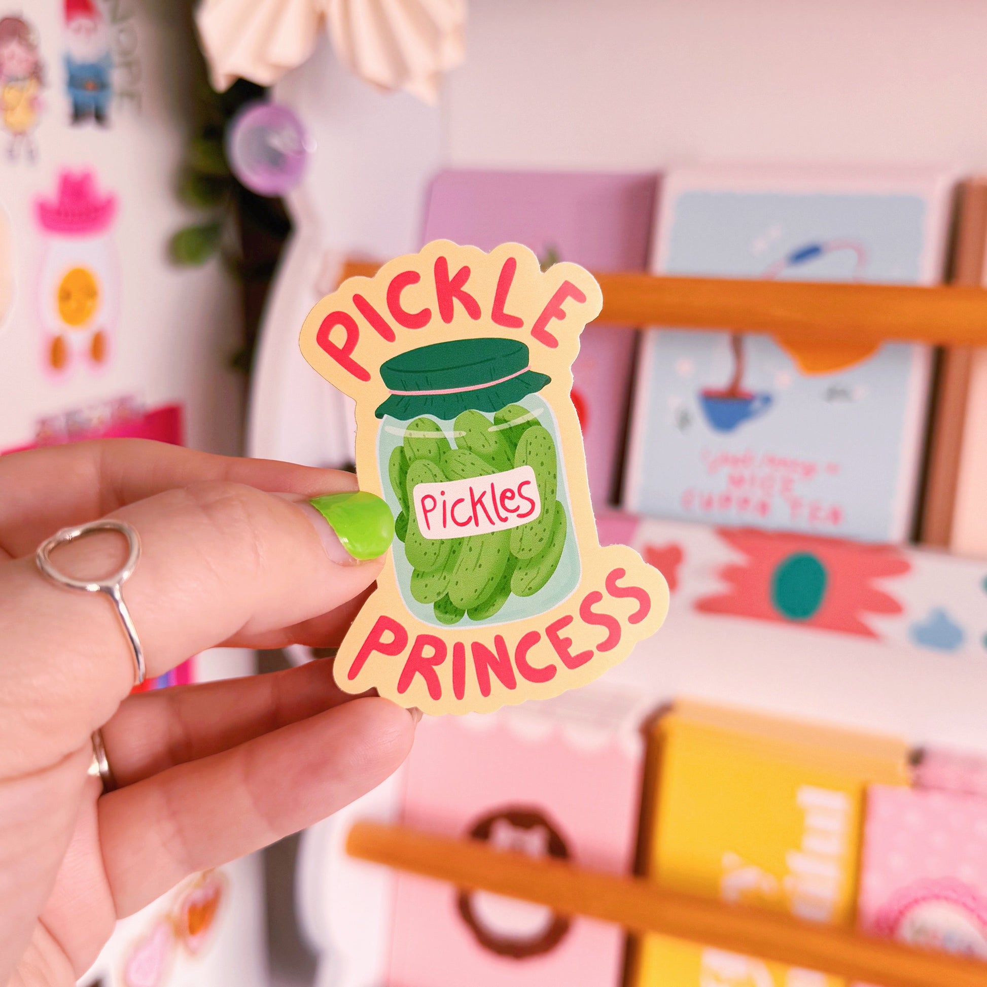 A waterproof vinyl sticker featuring a jar of pickles and the words 'pickle princess' around the jar illustration.