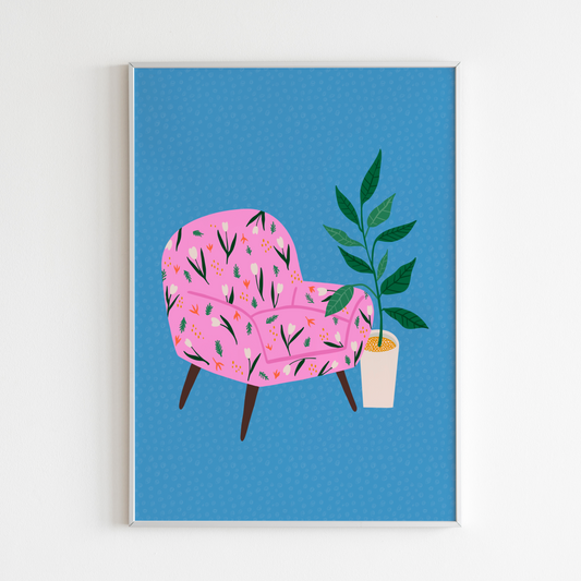 An illustration of a pink armchair, on a blue patterned background, next to a potted plant, shown in a frame.